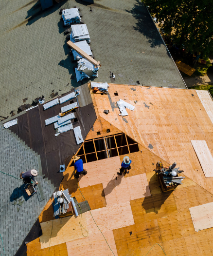 A group of men working on a roof